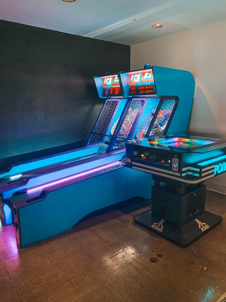 Two retro skeeball tables alongside classic pong. Fun bar in Tampa!