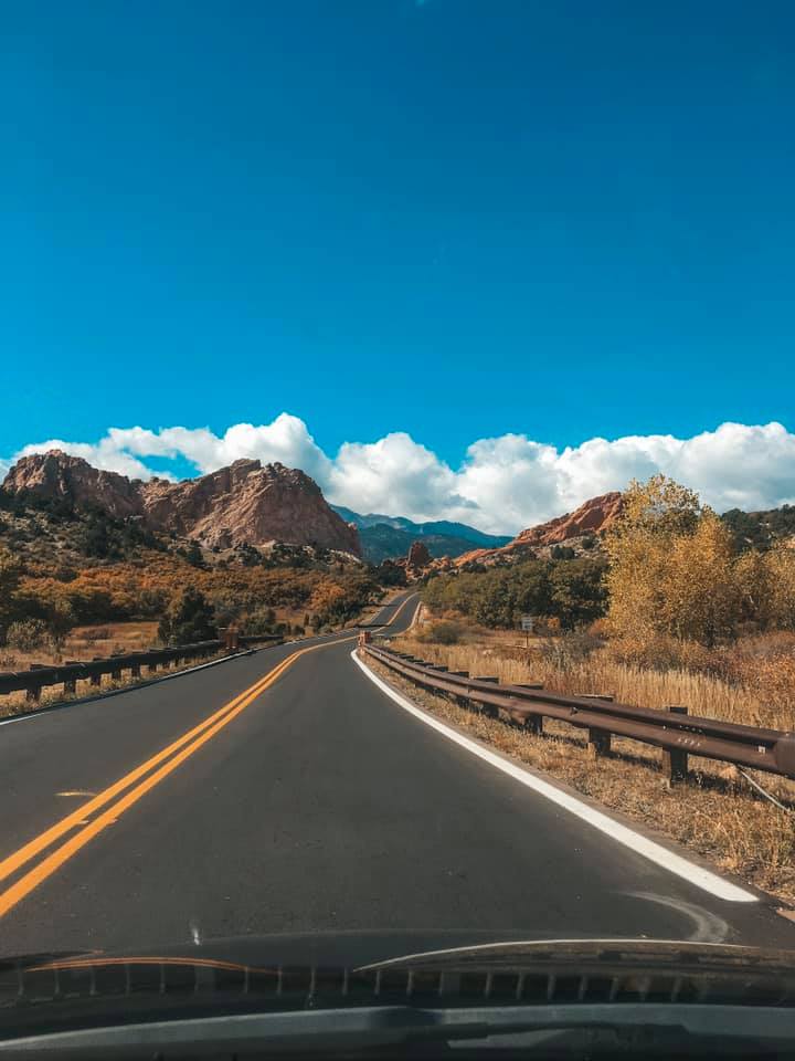 Traveling alone driving down the open roads of Colorado