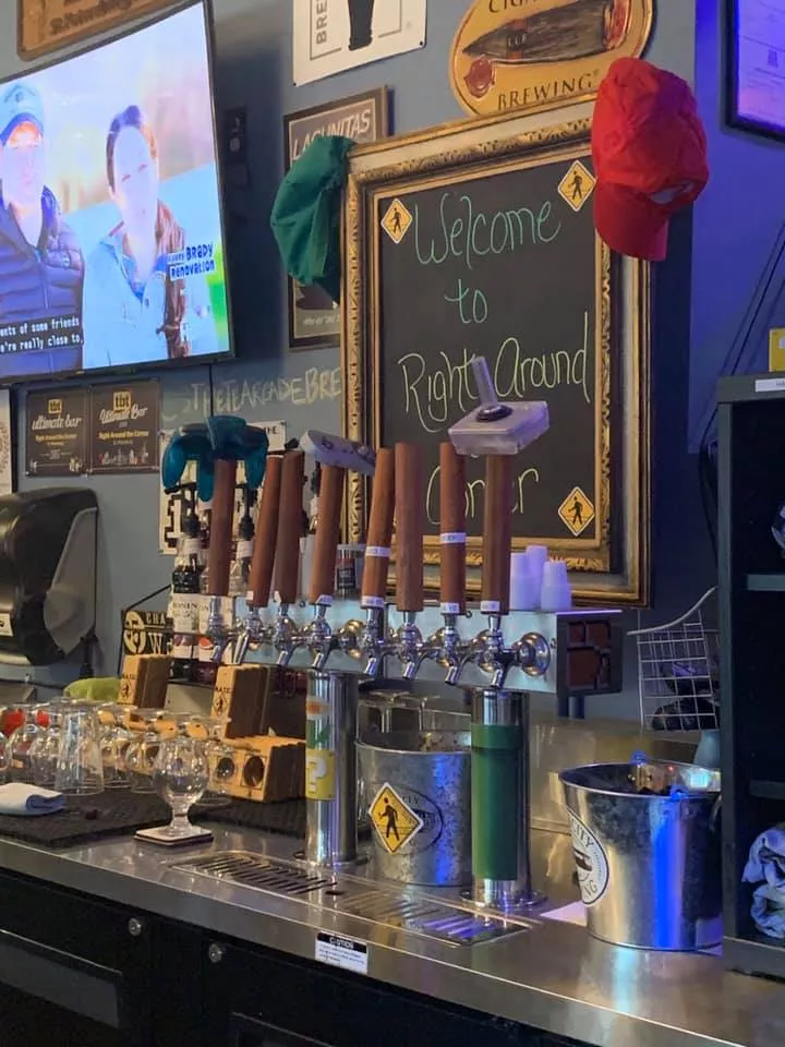 different beer taps, some accented with different game console controllers
