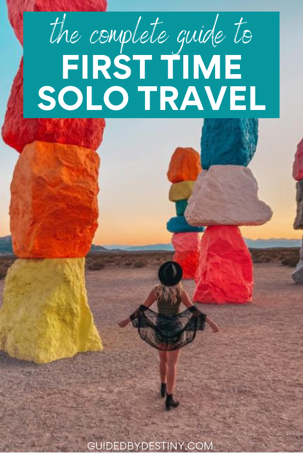 Female solo traveler at Seven Magic Mountains located right outside of Vegas