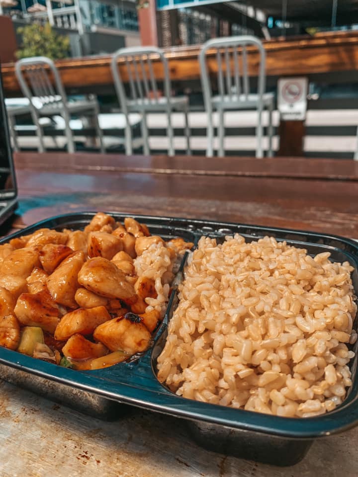 chicken hibachi with rice at outdoor patio seating