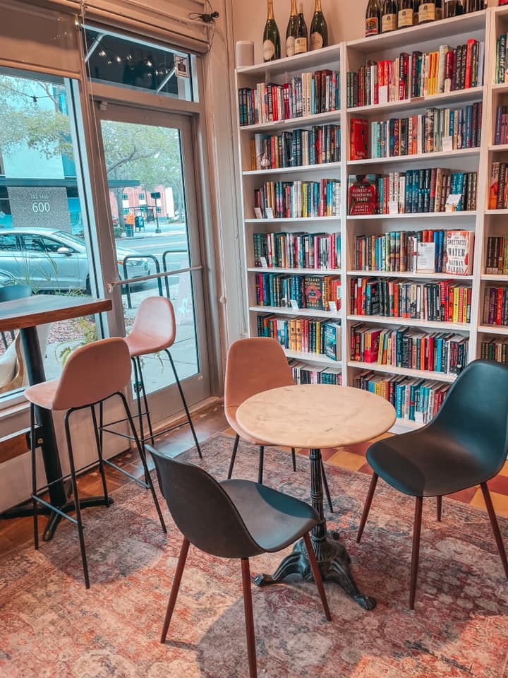 Books and seating area at Book + Bottle in downtown St. Pete