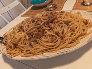 must try foods in Italy, a heaping pile of plated carbonara