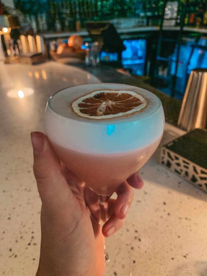 Pink drink with egg white foam from Sonder Social Club in Dunedin, Florida