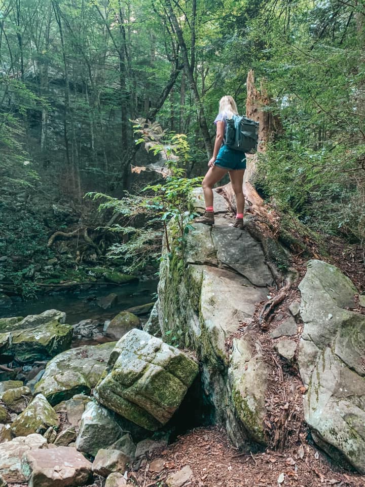 Climbing a giant rock at Foster Falls