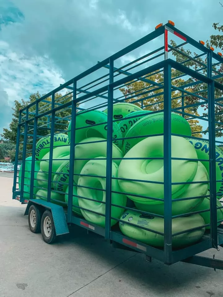 Cool River Tubing tubes in the back of a trailer