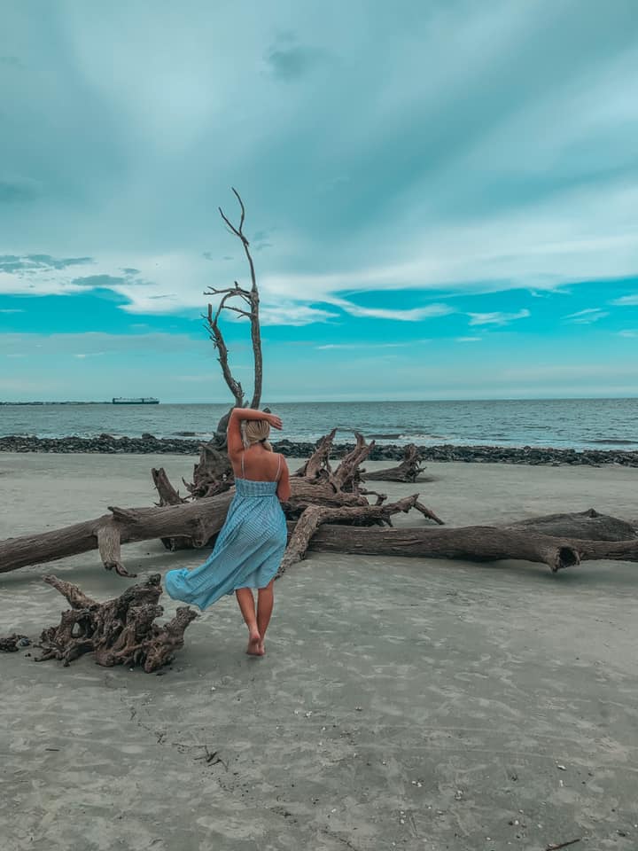 walking along Driftwood Beach on Jekyll Island, Georgia