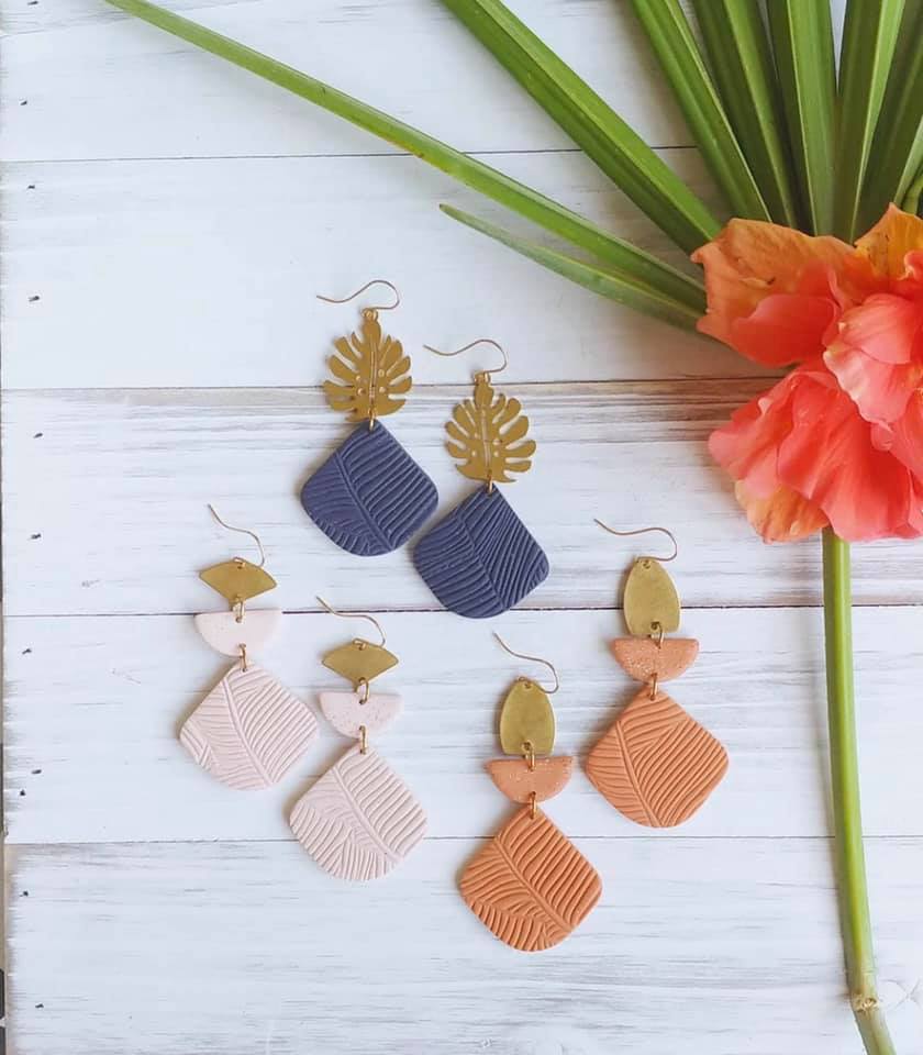 Three sets of Clay Pelican dangly earrings. Very unique gifts for travelers