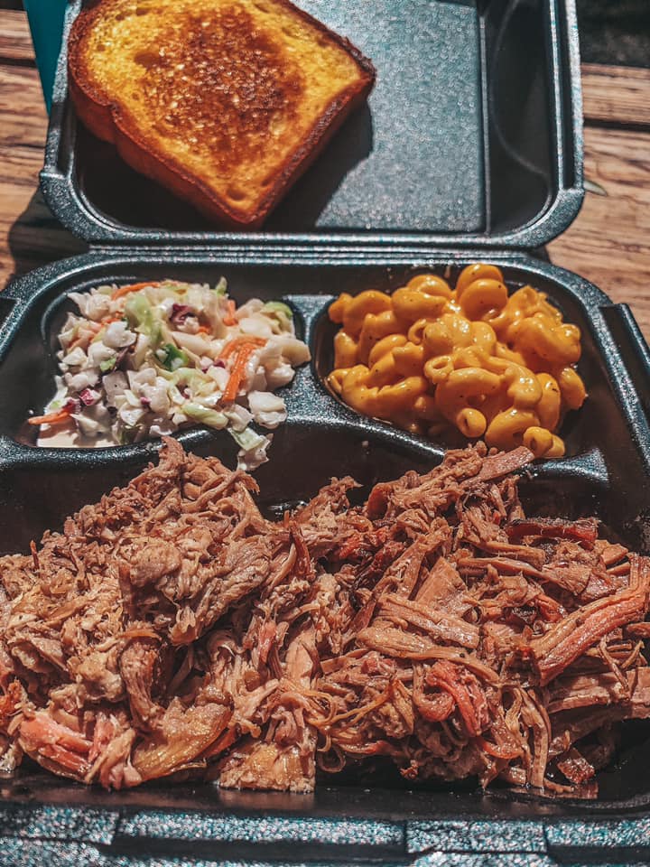 Pulled pork, pulled brisket, mac and cheese, and coleslaw from Wicked Oaks from one of the best Seminole Heights restaurants