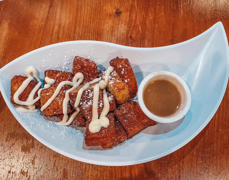 French toast bites and praline sauce from Ruby Slipper Cafe in Orange Beach, Alabama