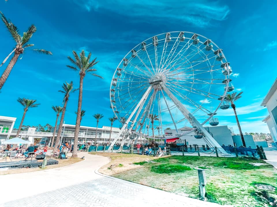 Ferris wheel and palm trees at The Wharf, one of the top things to do in Orange Beach