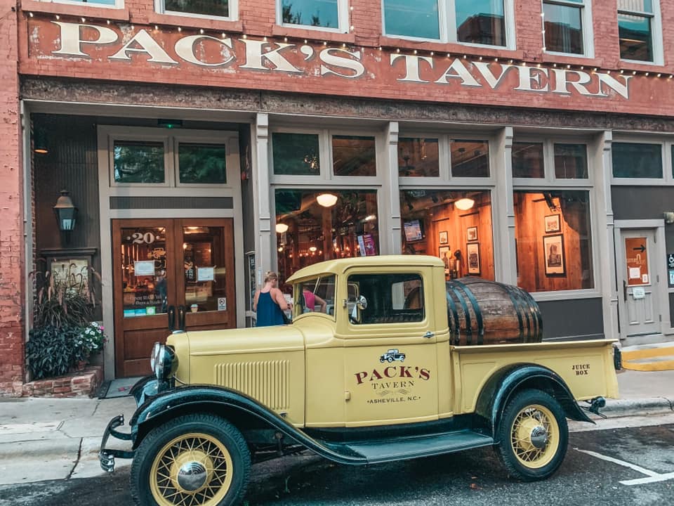 old truck in front of Pack's Tavern