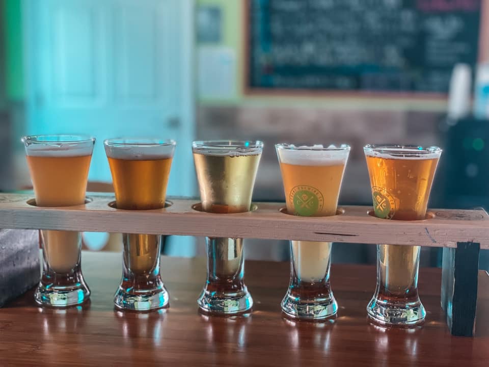 flight with 5 samples of beer from cueni brewing
