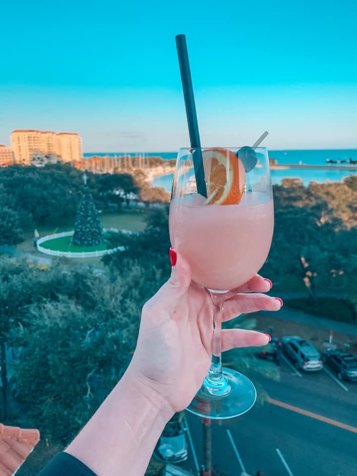 frose with views from the top of the rooftop bar The Canopy in downtown St Pete