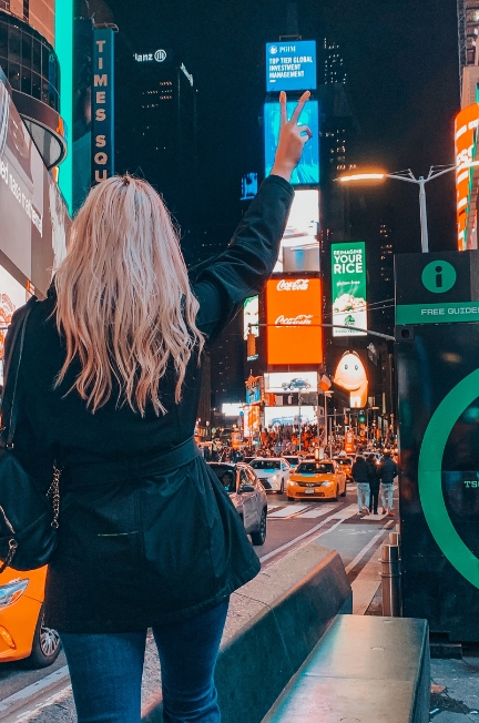 Woman in NYC at night, tips for moving to a new city alone