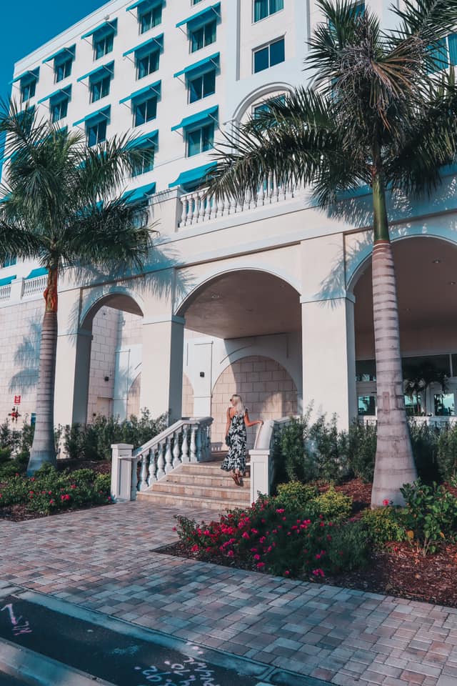Woman entering the Karol Hotel in Clearwater