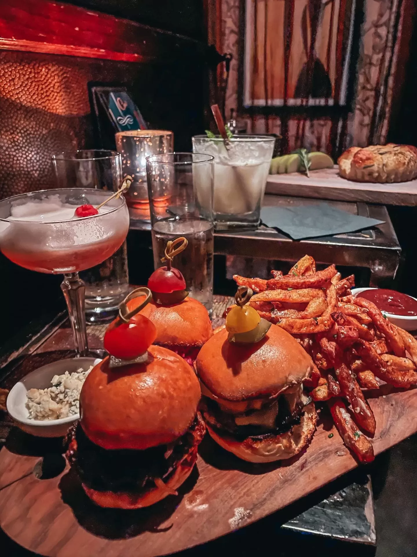 Burger trio and duckfat fries with craft cocktails from Ciro's Speakeasy in Tampa for date night restaurants