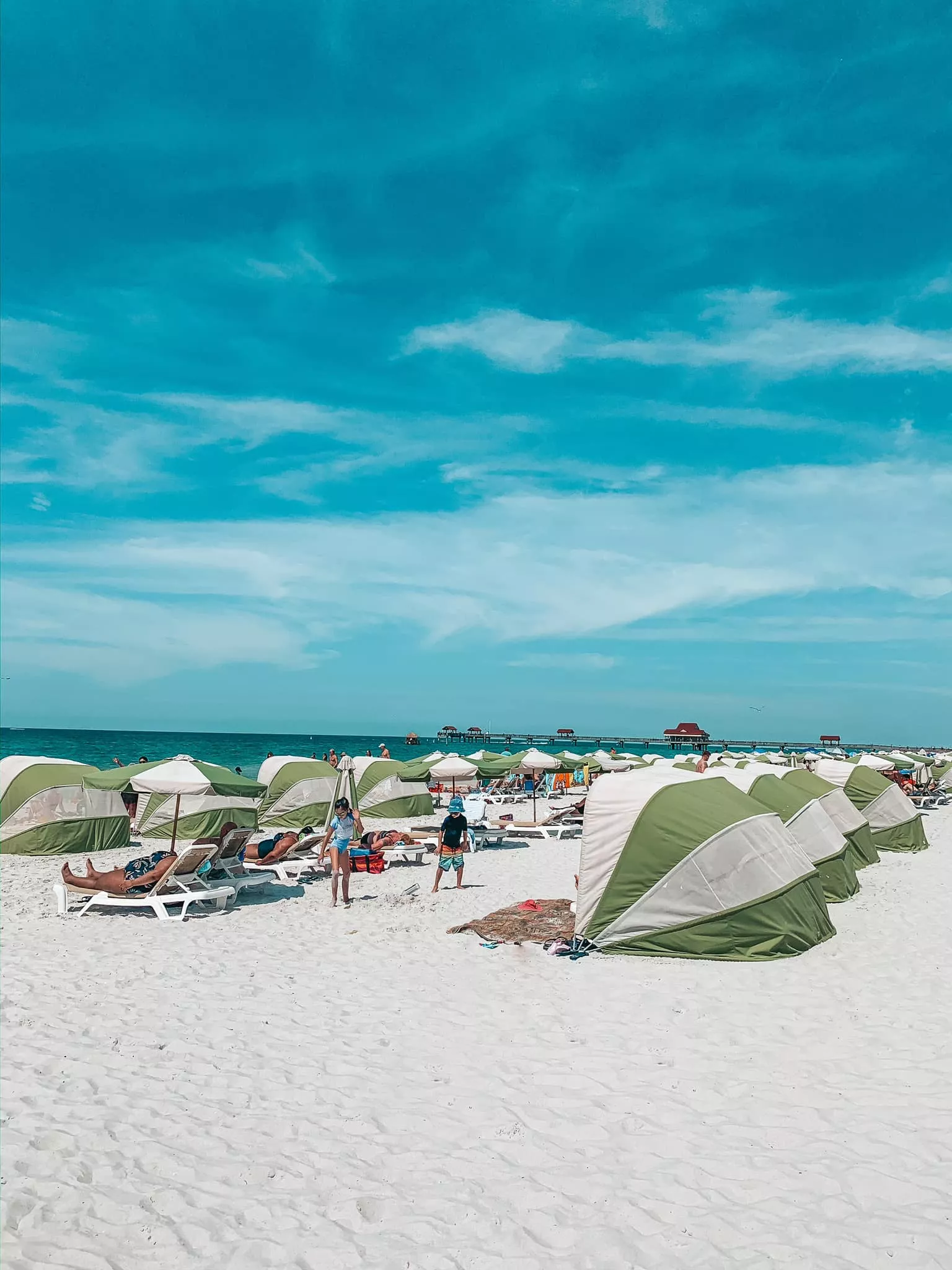 Clearwater Beach beach lounge chairs with shade on Clearwater Beach, Florida