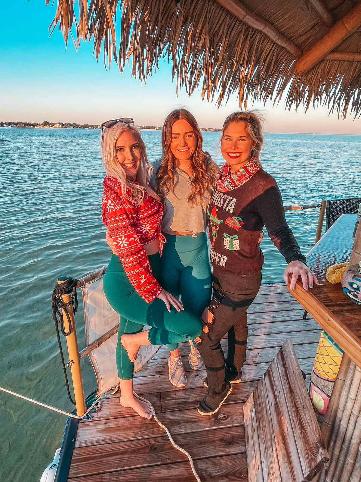 3 girls posing for a photo on Cruisin Tikis