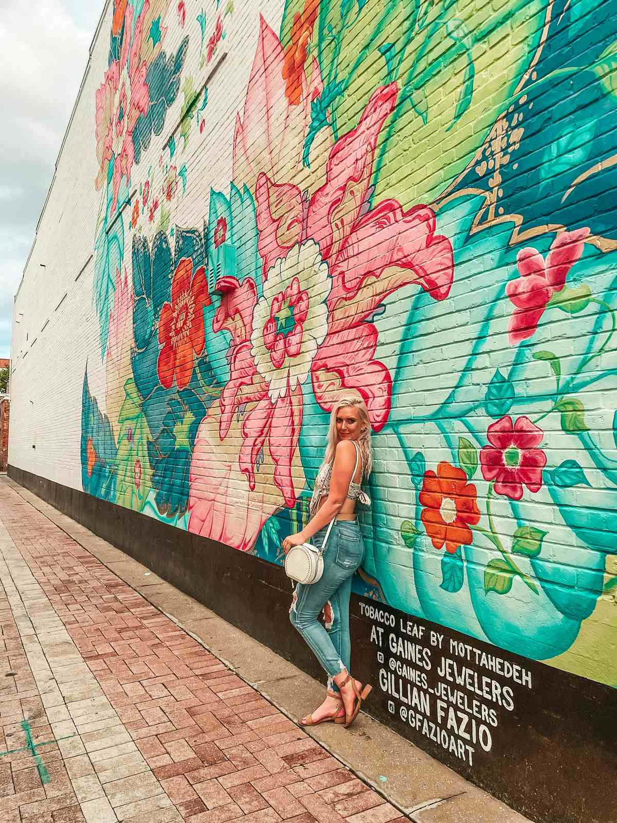 Woman at colorful mural in Lakeland Florida