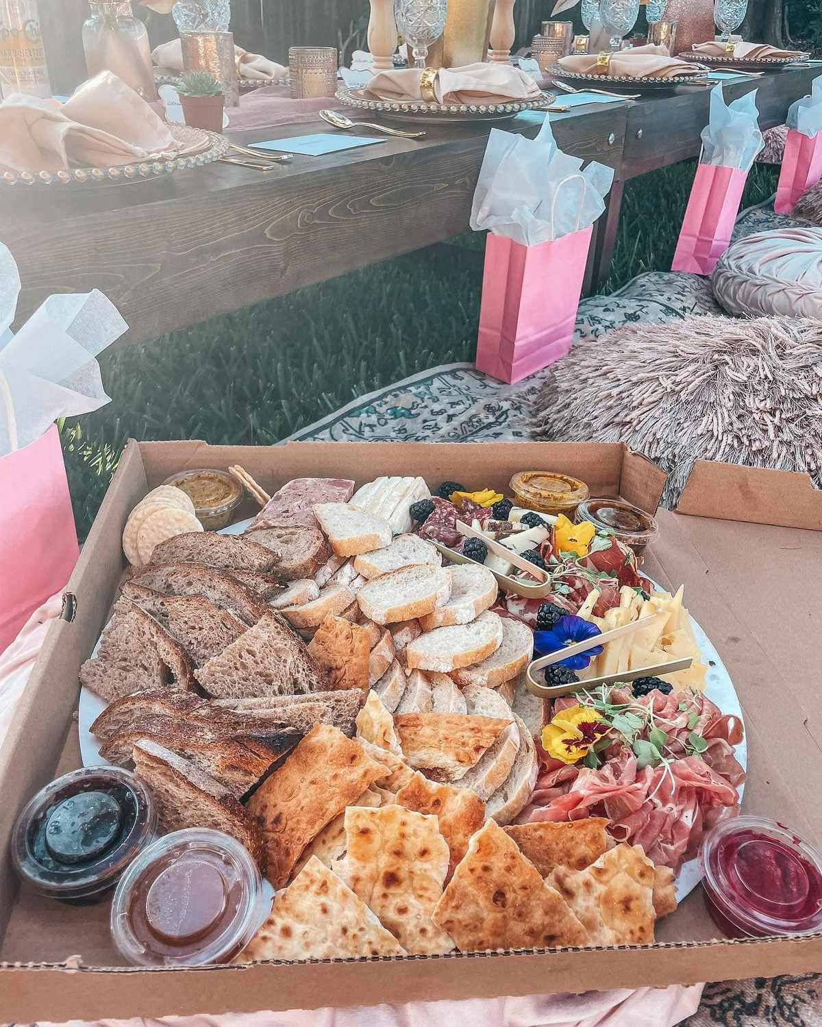 sea grapes charcuterie board at backyard picnic