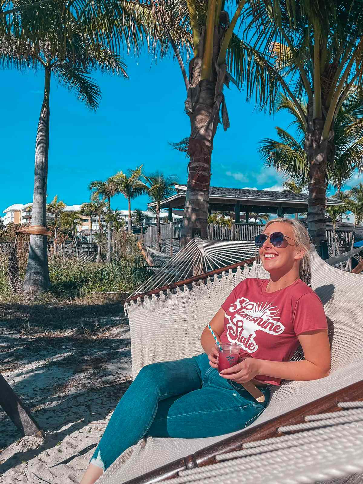 woman relaxing on a hammock on St. Pete Beach