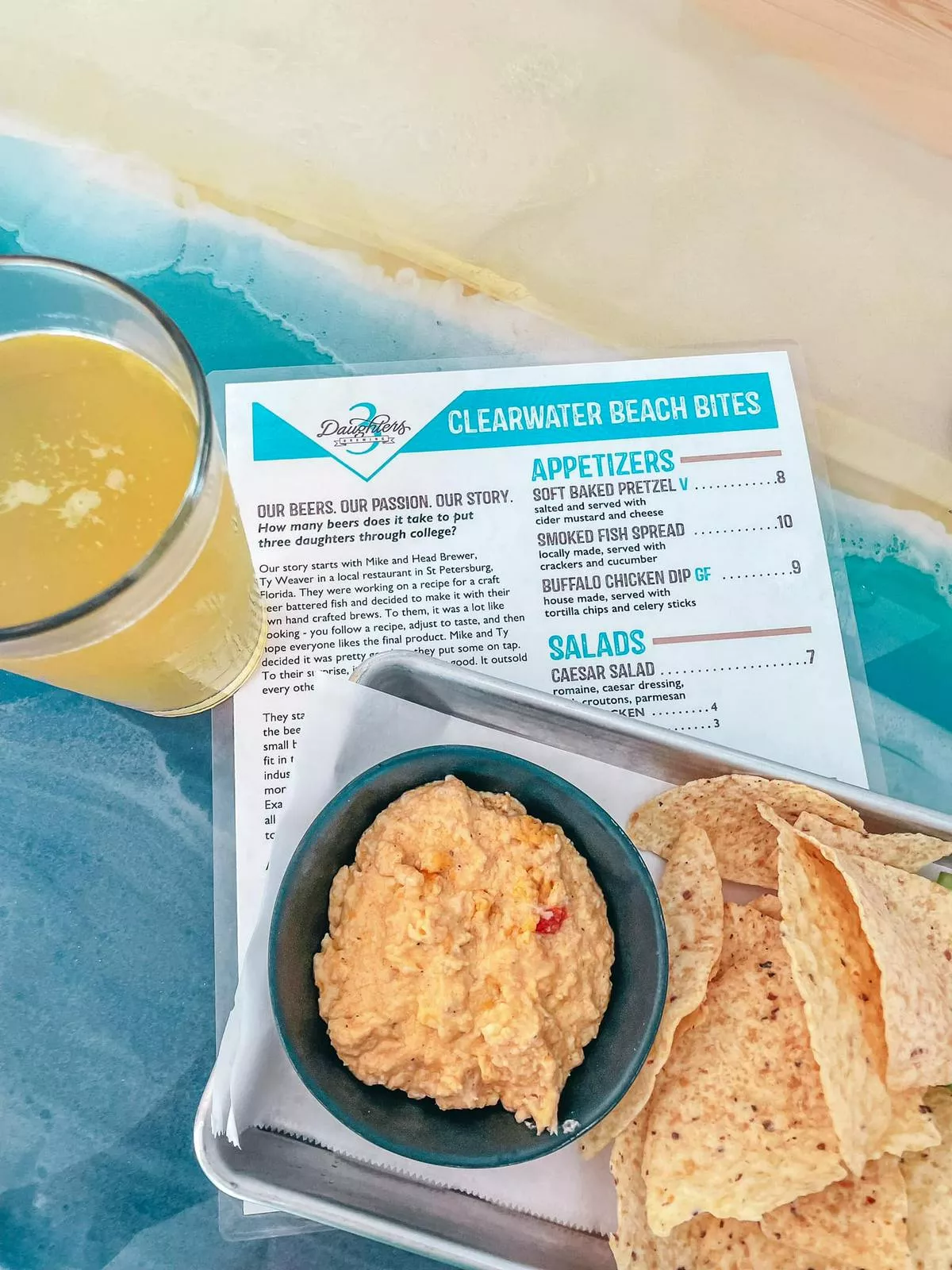 Buffalo chicken dip and a draft from 3 Daughters Tasting Room in Clearwater Beach