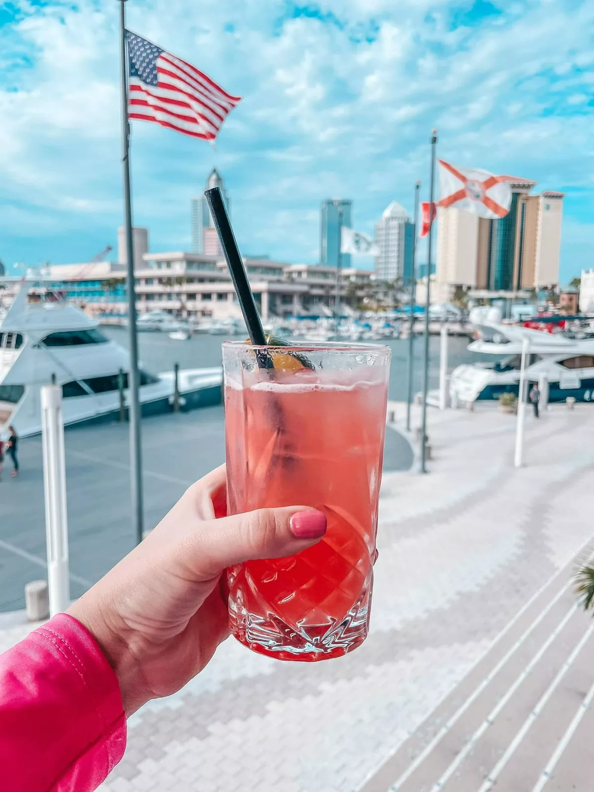 fun drink from American Social in Tampa with water and city in the background