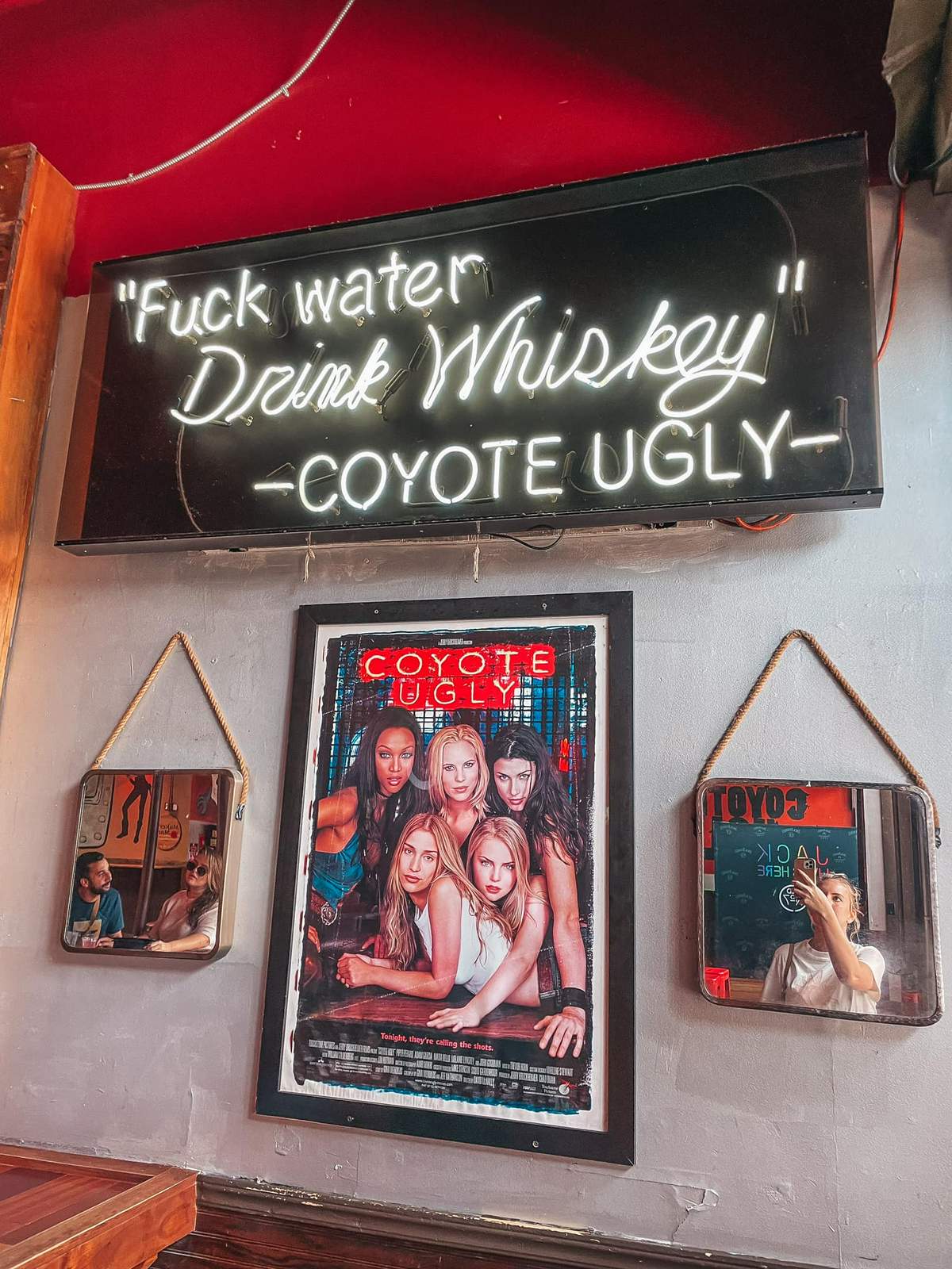 "Fuck Water Drink Whiskey" sign at Coyote Ugly saloon in Ybor City