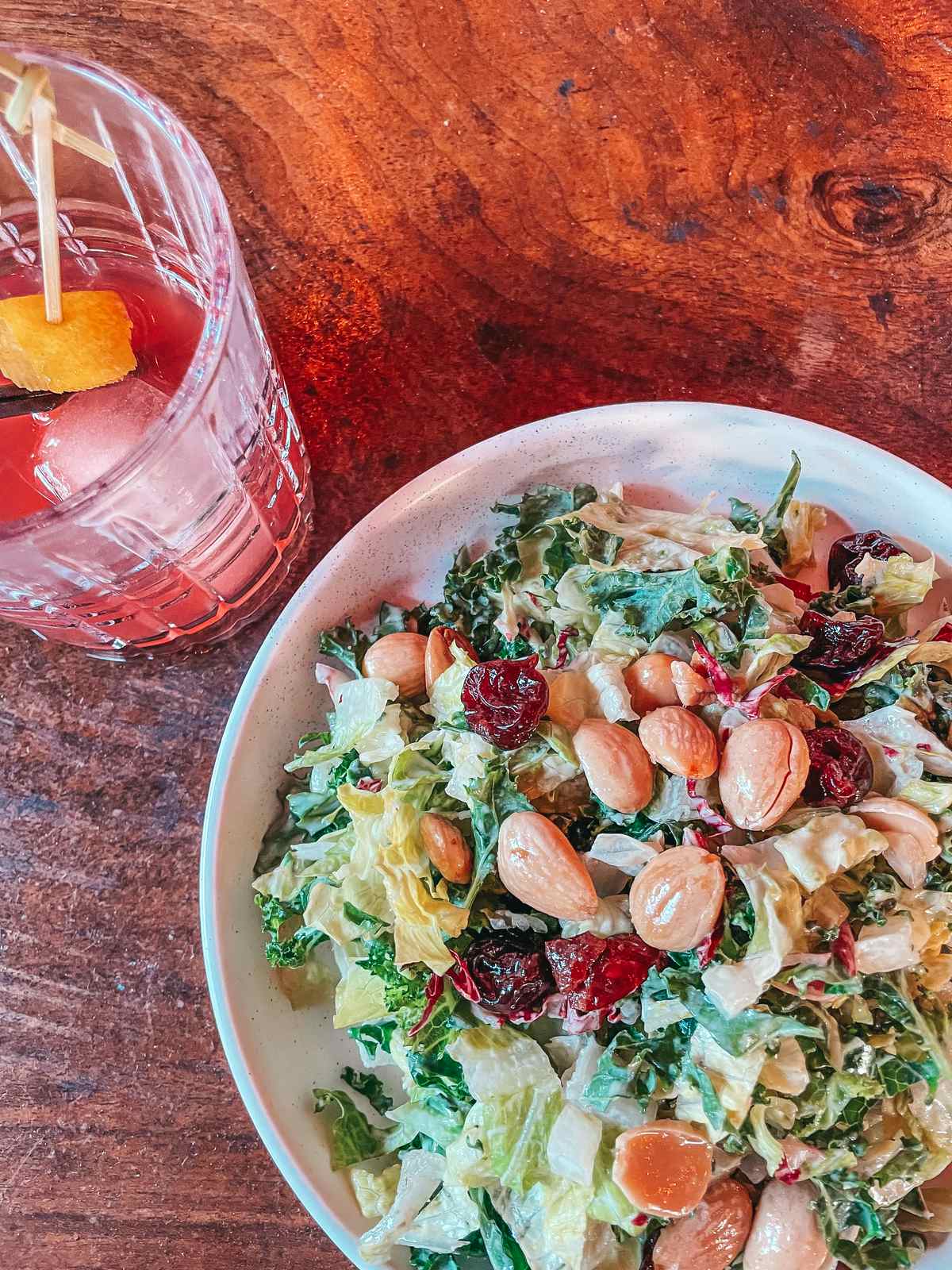 Salad and cocktail from Forbici in Hyde Park Tampa