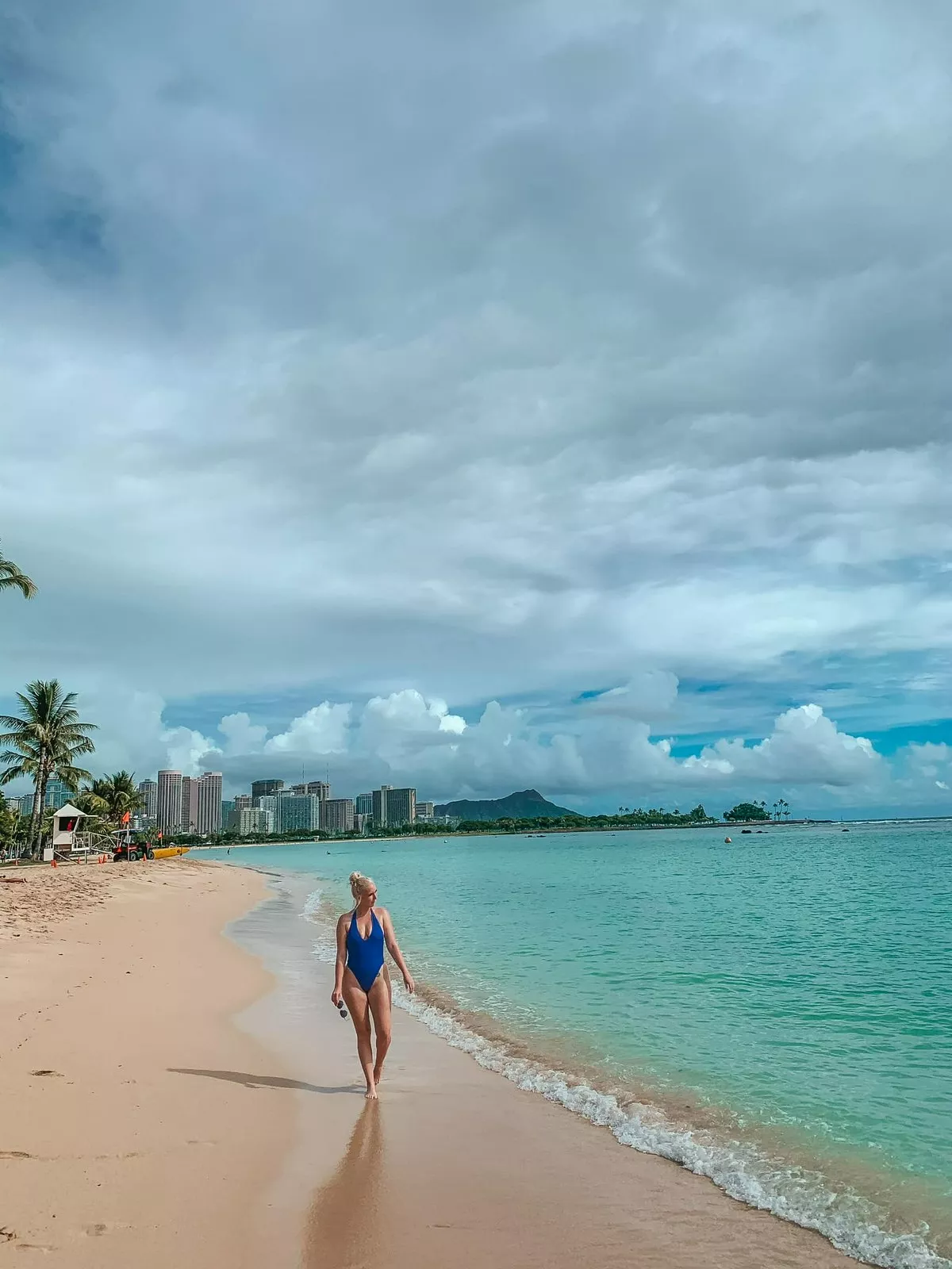 Enjoying a stroll on a beach in Oahu