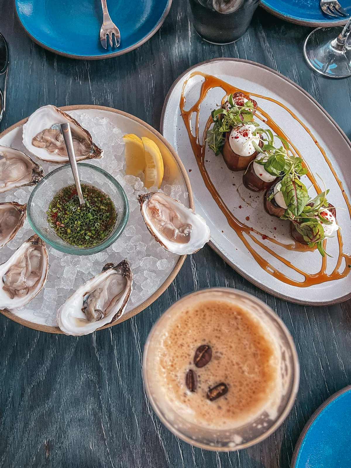 Eggplant, oysters, and an espresso martini from Electric Lemon, a restaurant in NYC