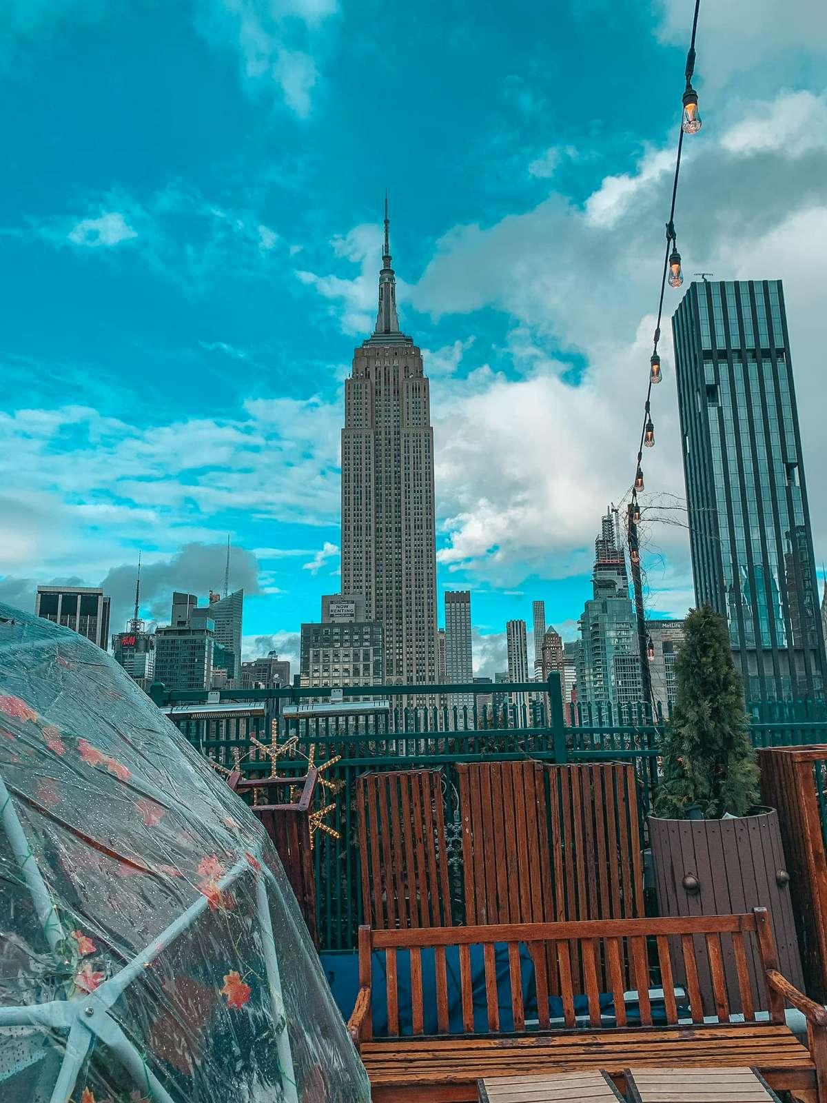 View of the Empire State Building from an NYC rooftop bar