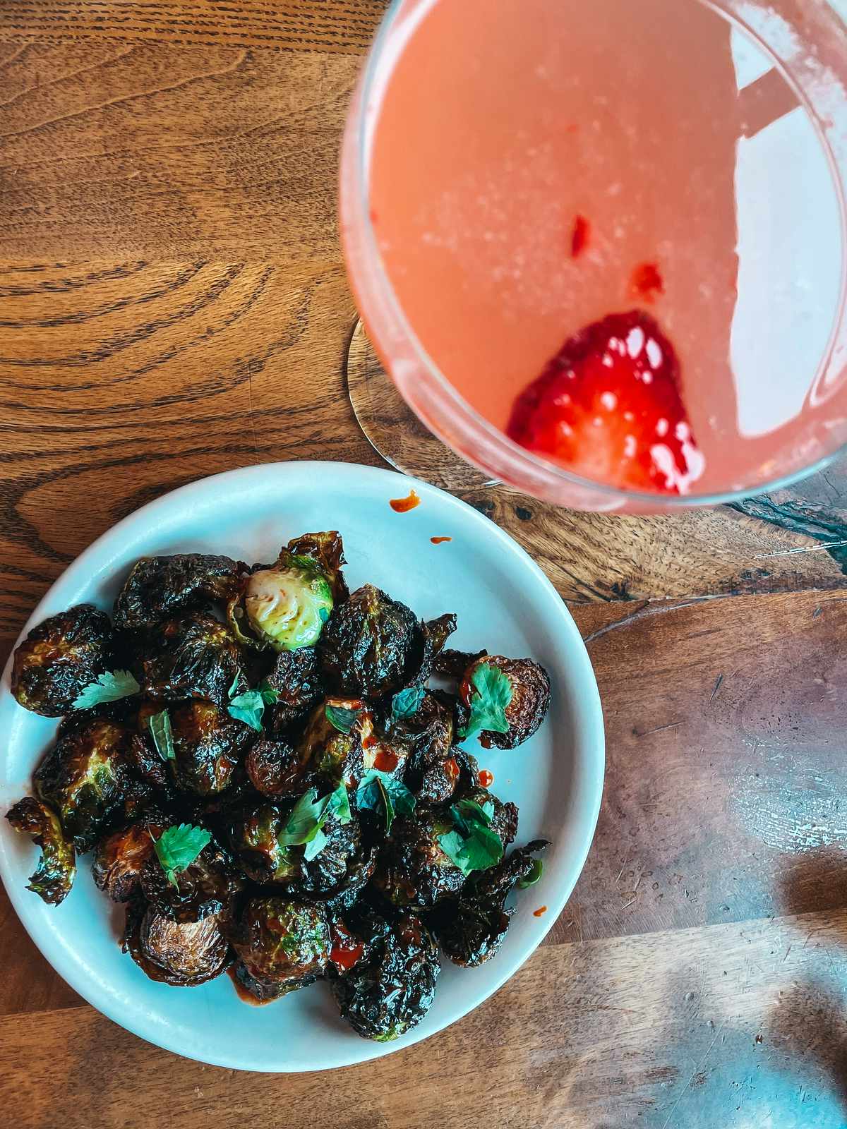 Brussel sprouts and cocktail from Culinary Dropout restaurant in Scottsdale Arizona
