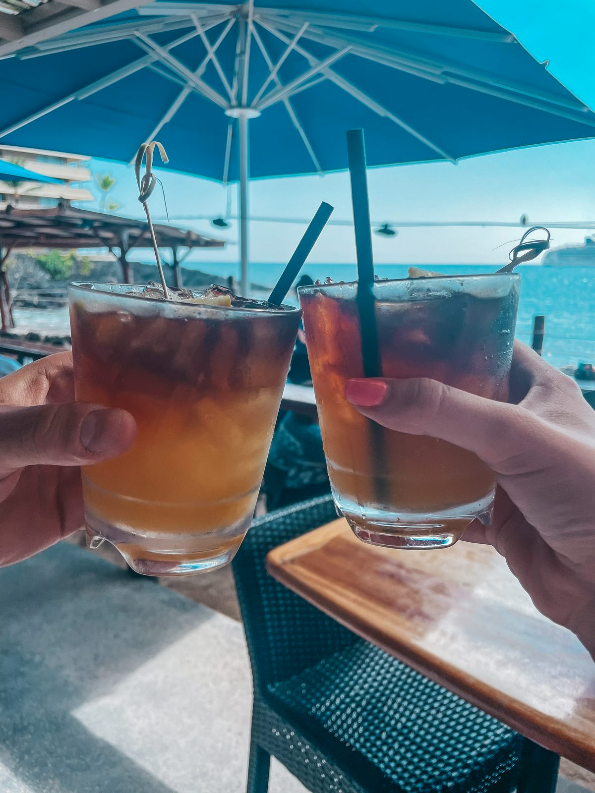 Happy hour mai tais from Huggos on the Rocks