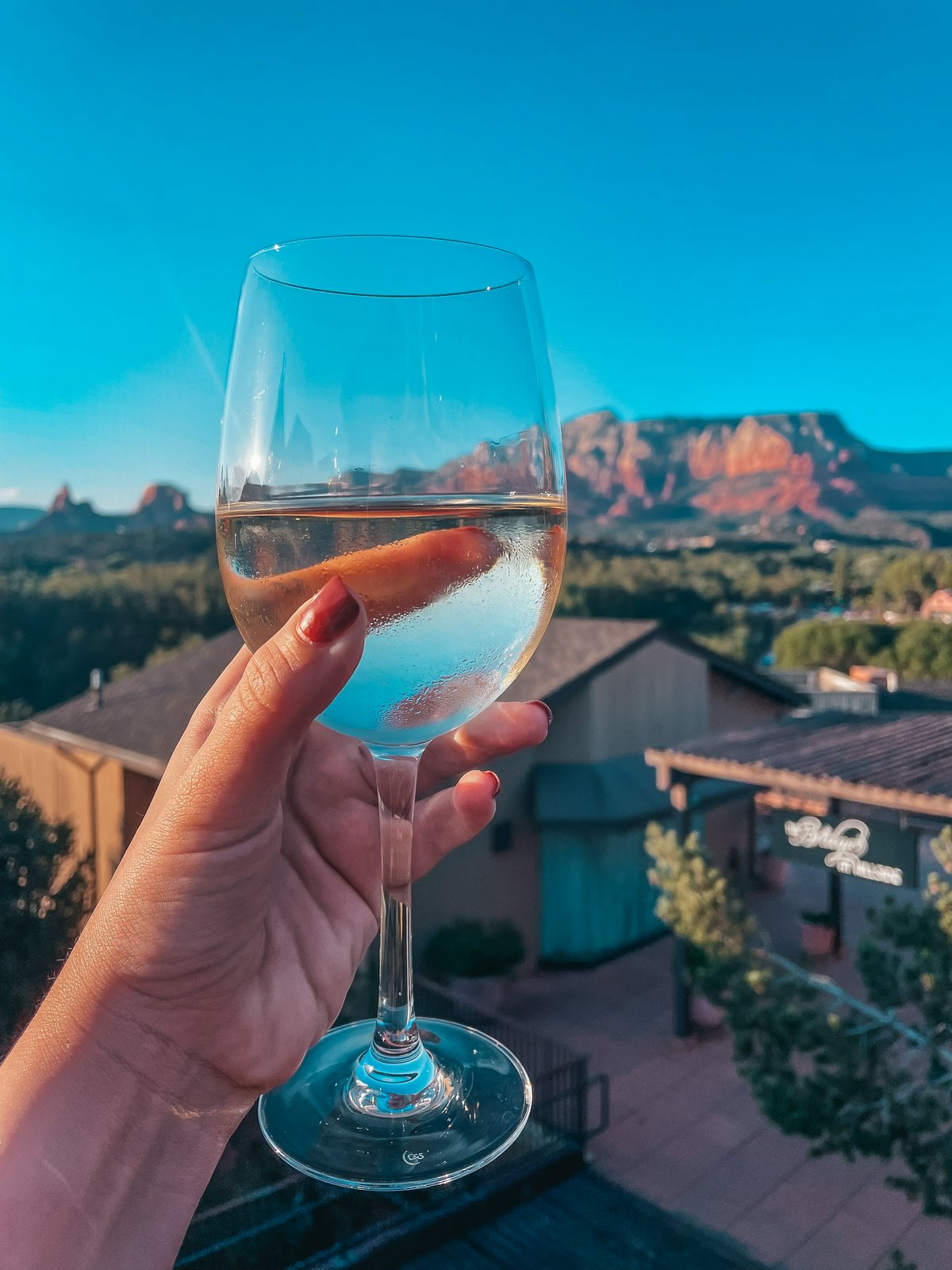 Glass of white wine from The Hudson restaurant in Sedona Arizona