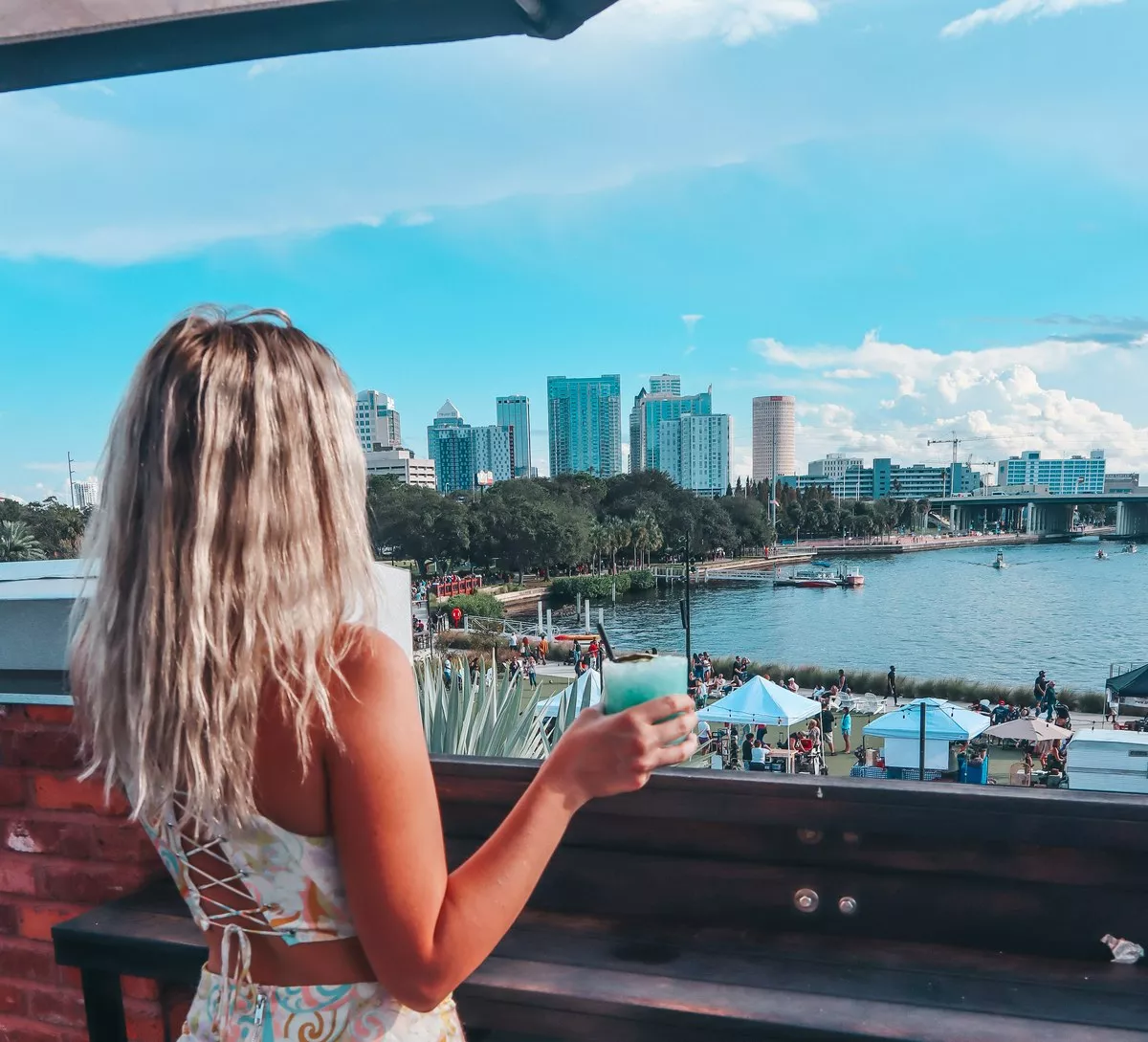 woman enjoying the views from M Bird rooftop bar in Tampa for a florida bachelorette