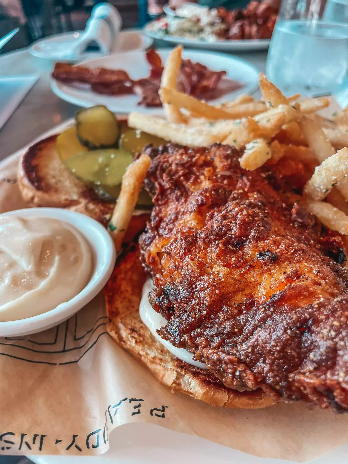 Fried chicken sandwich and fries from The Library in downtown St. Pete