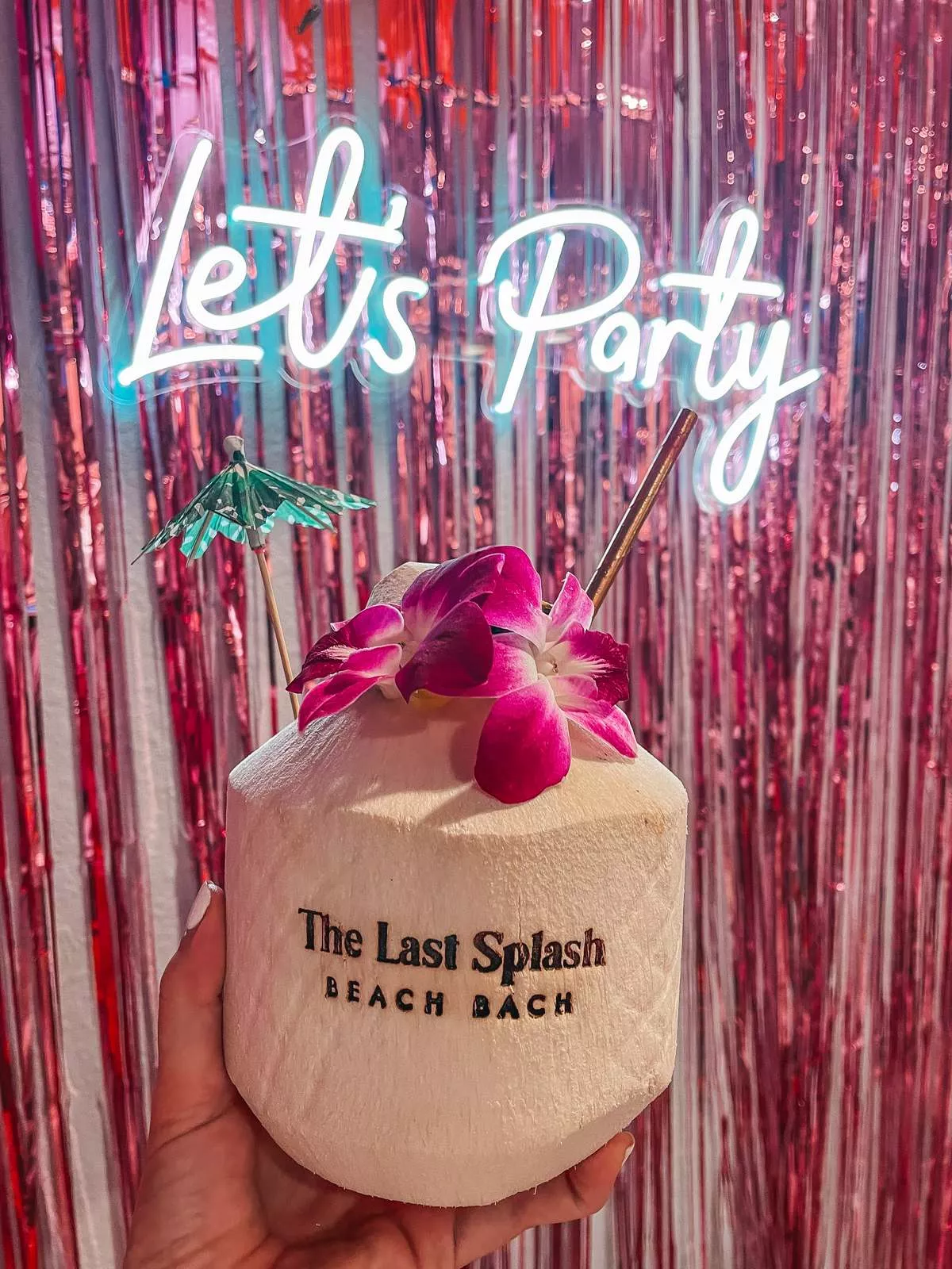 Custom coconut with Lets Party neon sign bachelorette party