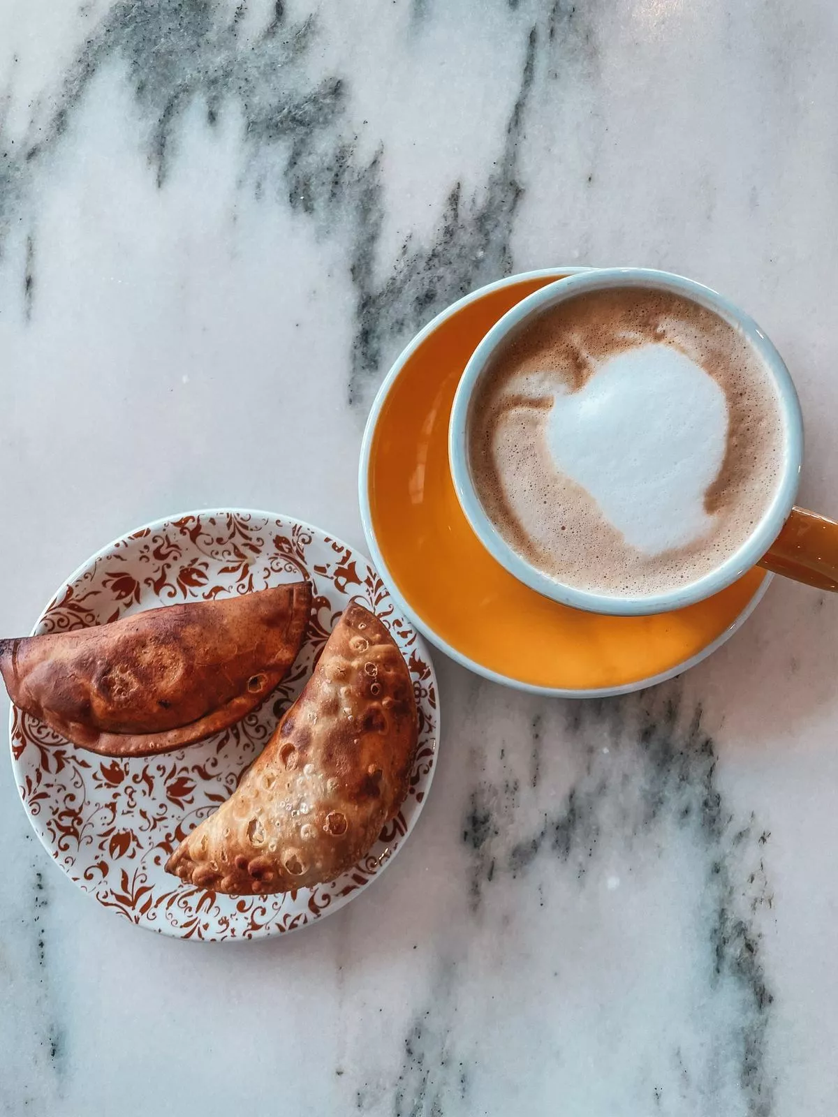 Cappuccino and emanadas from Cafe Quiquiriqui in Ybor