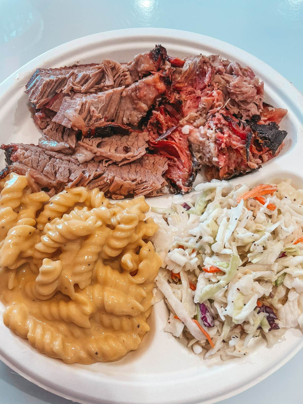 IDK BBQ in Tropic. Mac and cheese, brisket, and coleslaw