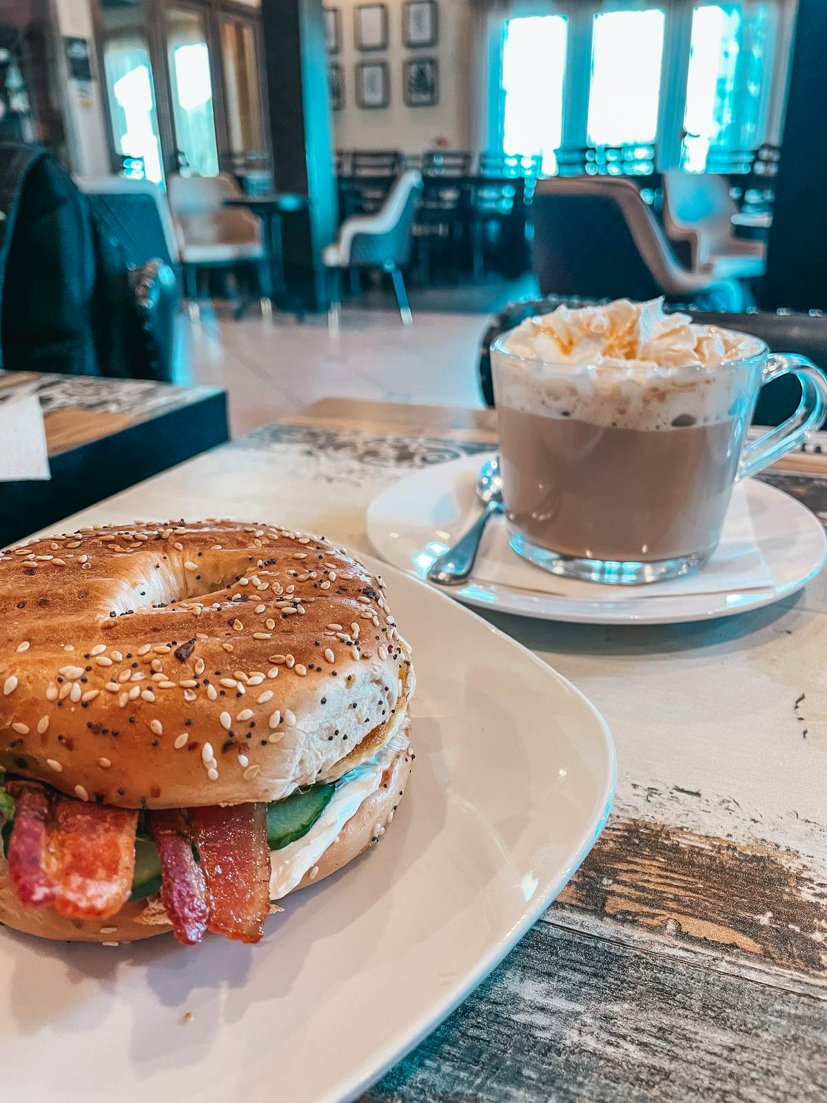 Caramel Brulee latte and breakfast bagel from Veskolini Cafe in Dunedin