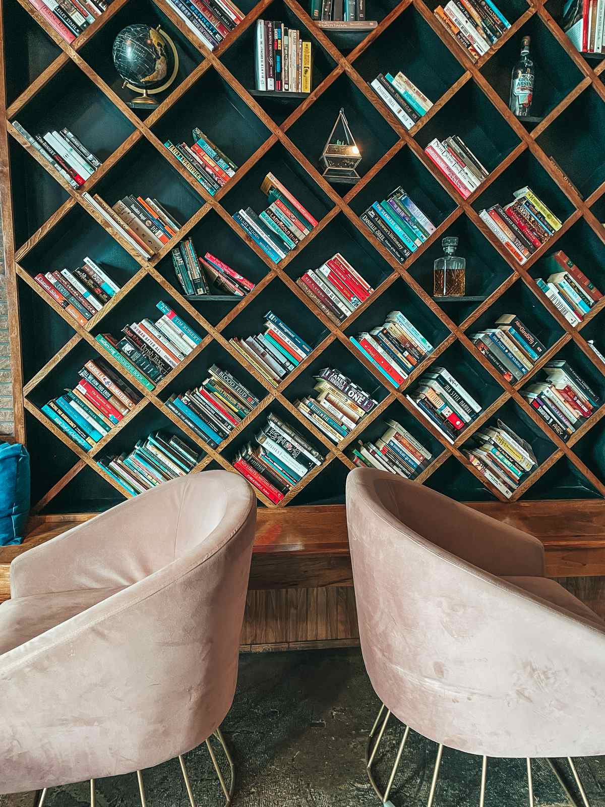Bookshelves and seating at Revival craft bar in Lakeland