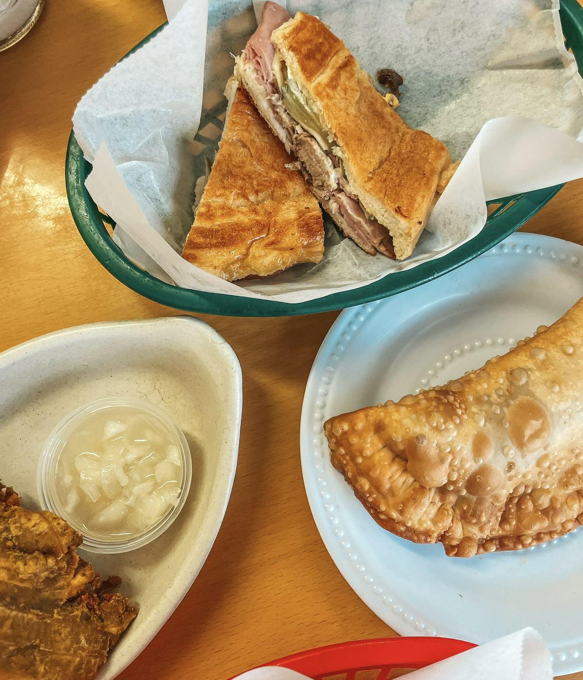 Cuban, empanada, and tostones from West Tampa Sandwich Shop