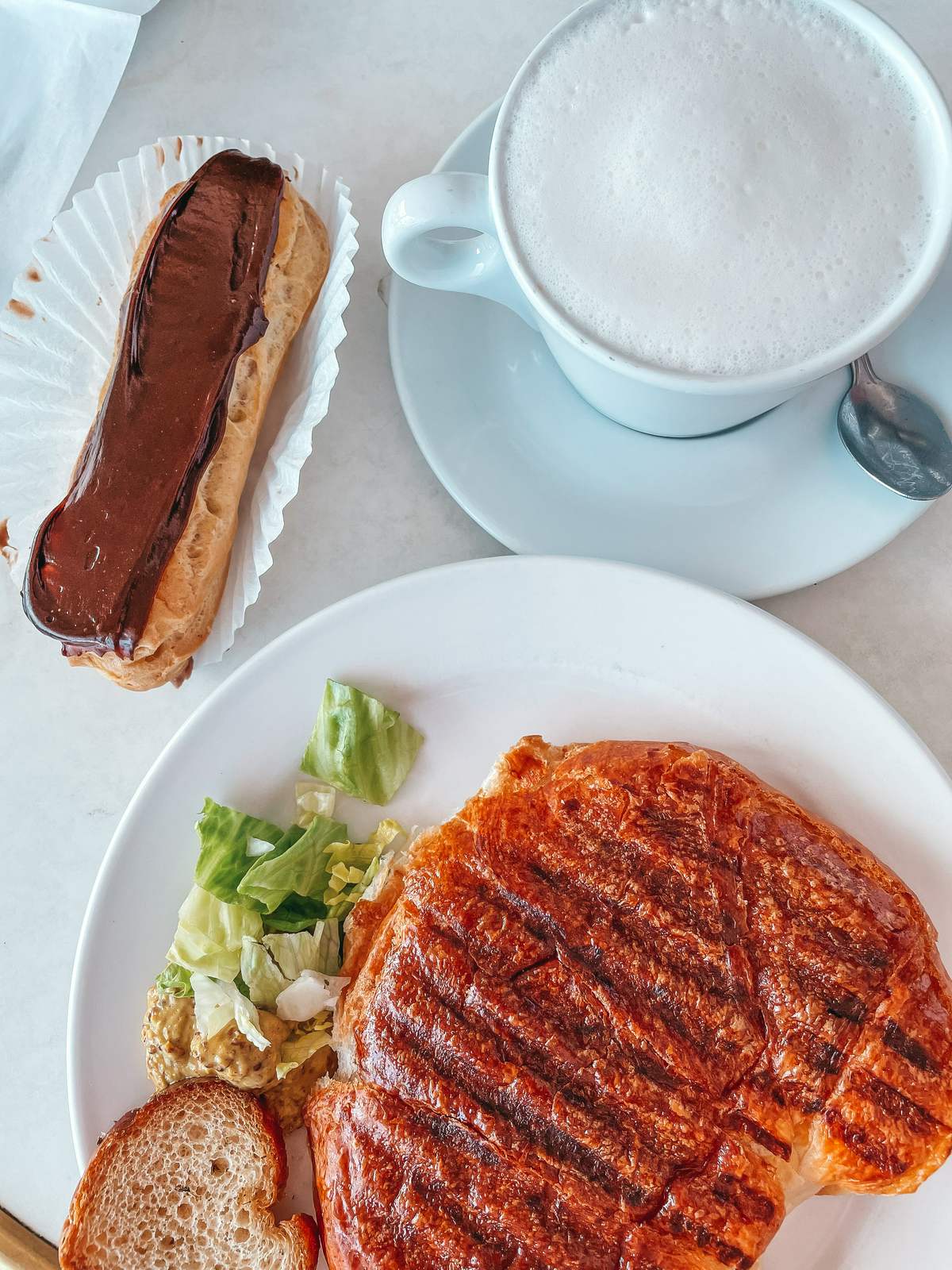 Croissant and eclair from Cafe de Paris