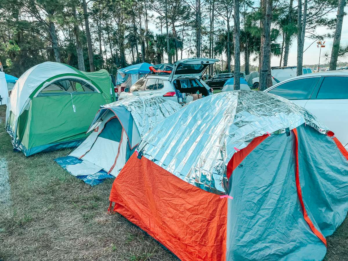 set up tents included in the camping festival packing list
