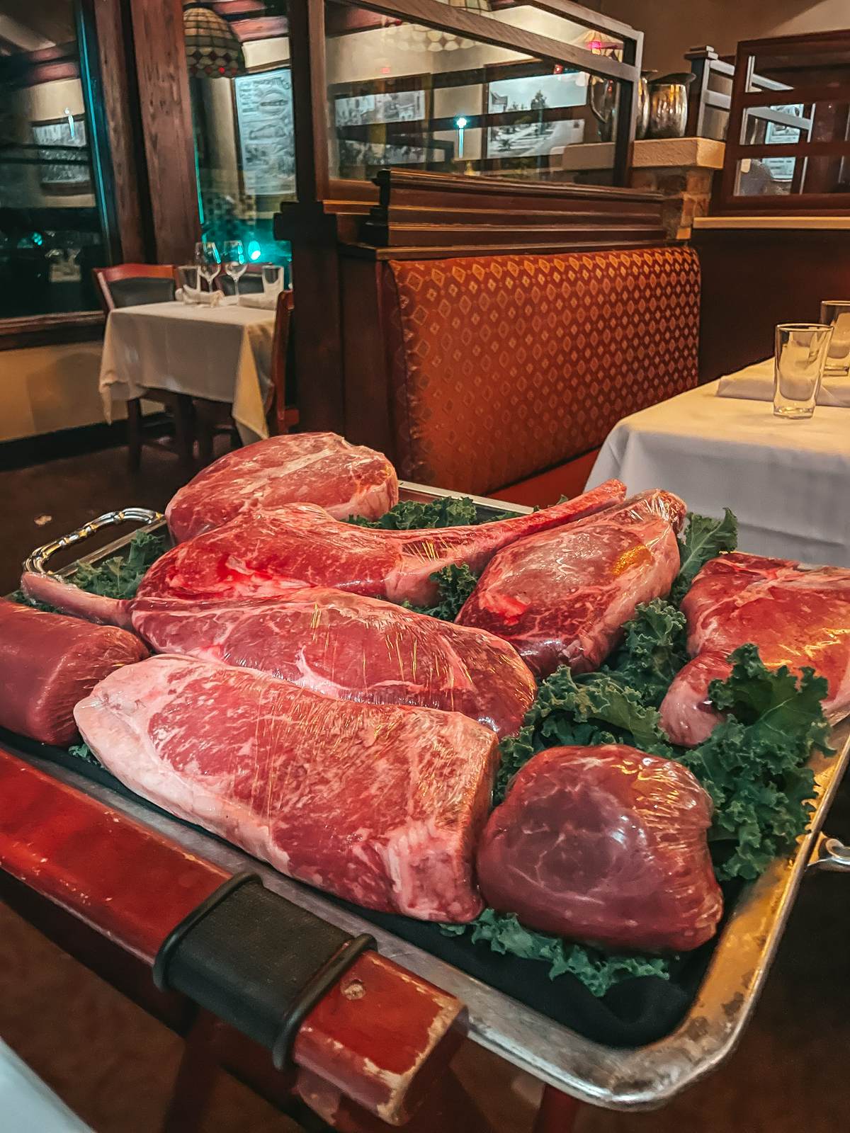 Tray of steak cuts at Charley's Steakhouse in Tampa