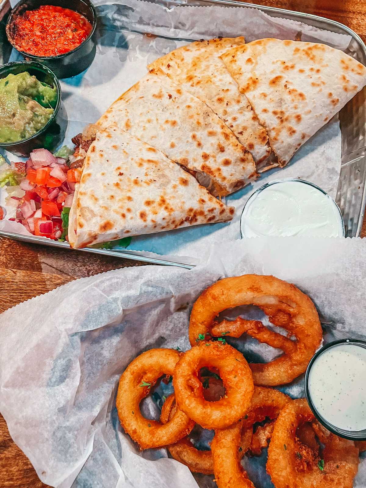 Quesadilla and onion rings from Guilty Sea Sports Pub in IRB