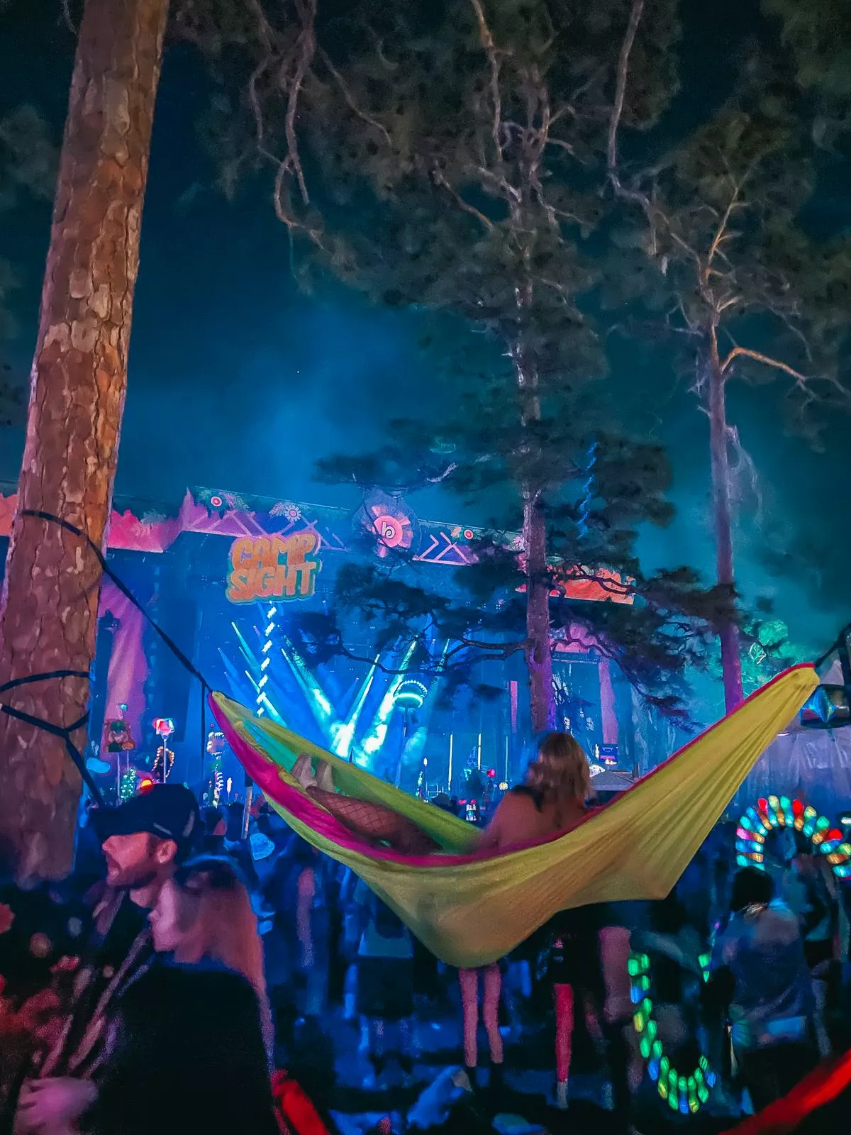 woman in a hammock during a concert