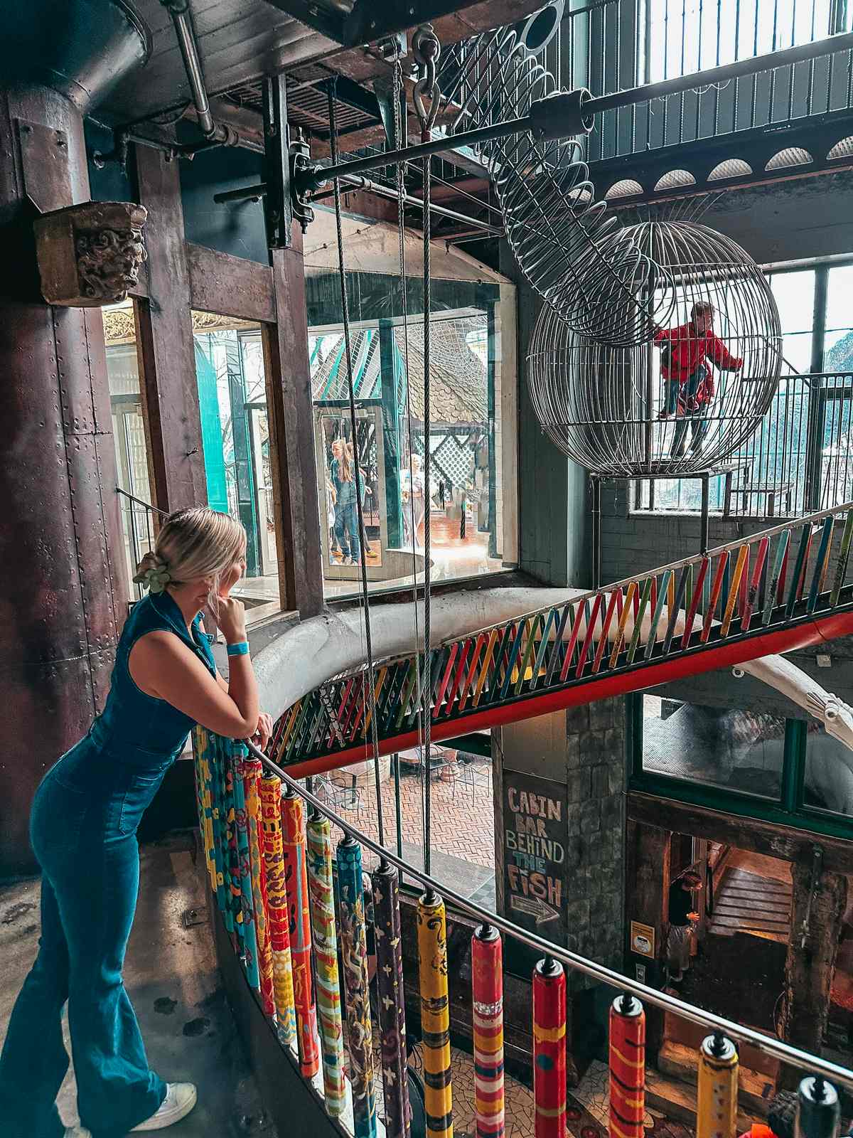 woman looking in the artworks in City Museum while spending the Weekend in St. Louis 